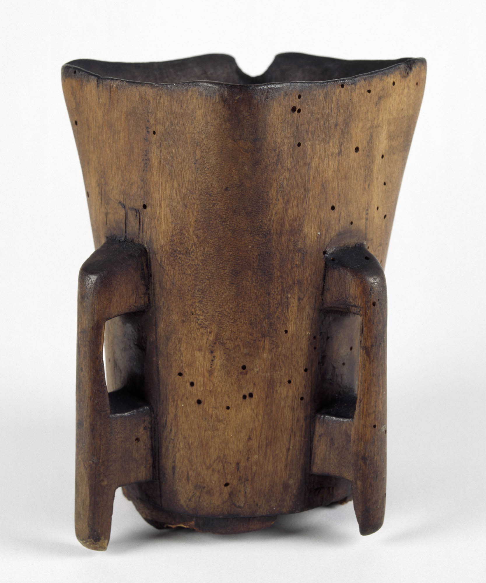 Square rustic-looking wooden cup with two handles that touch the ground.