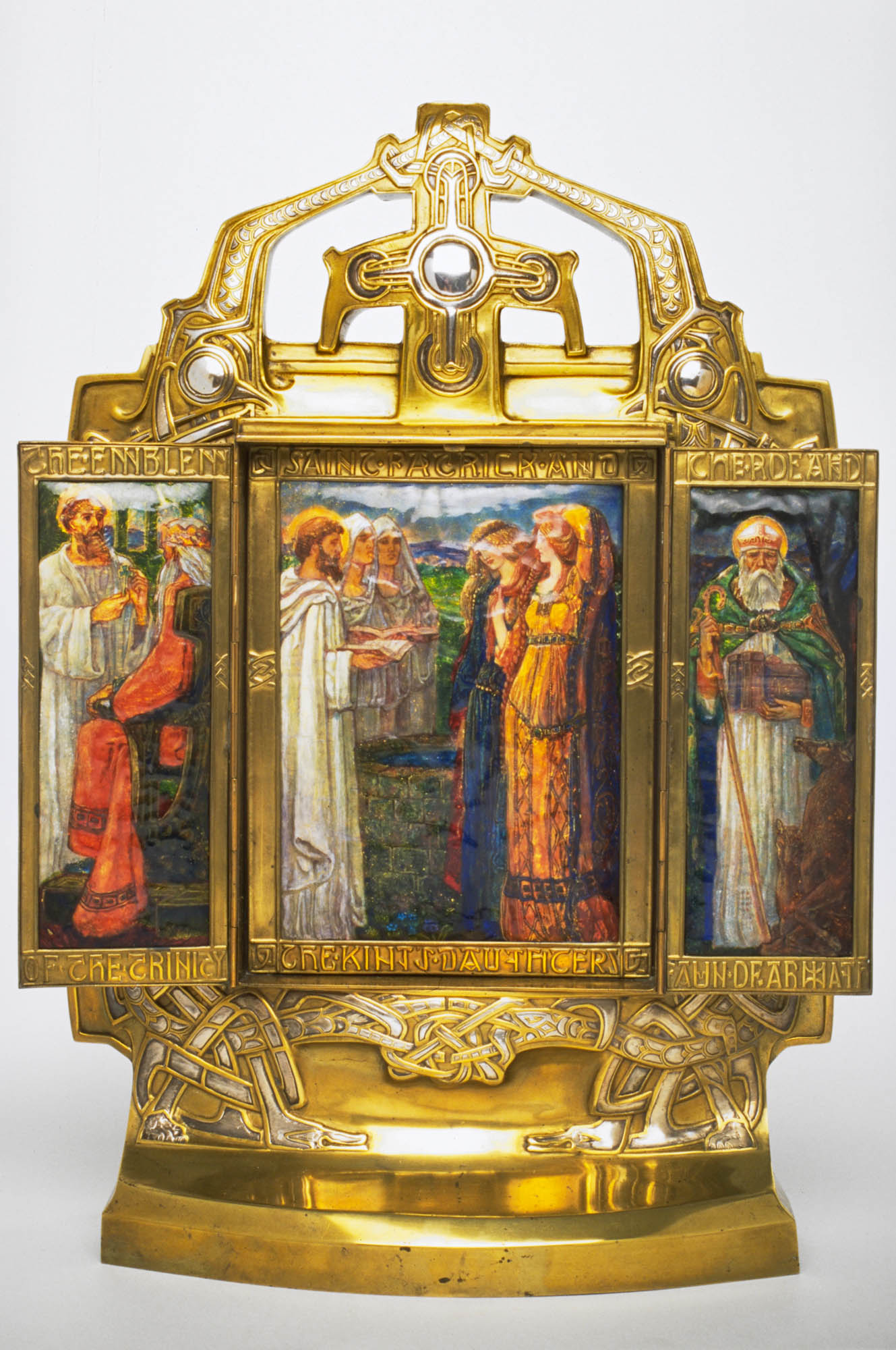 Golden triptych with interlace decorations on top and bottom with three paintings of figures in colourful robes.