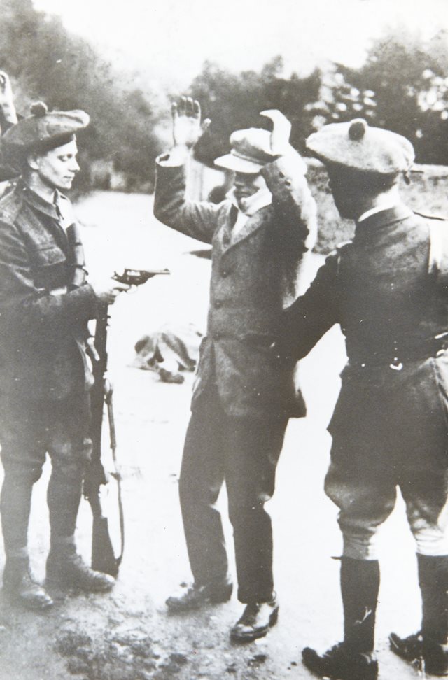 Auxiliaries searching civilian, c. 1921