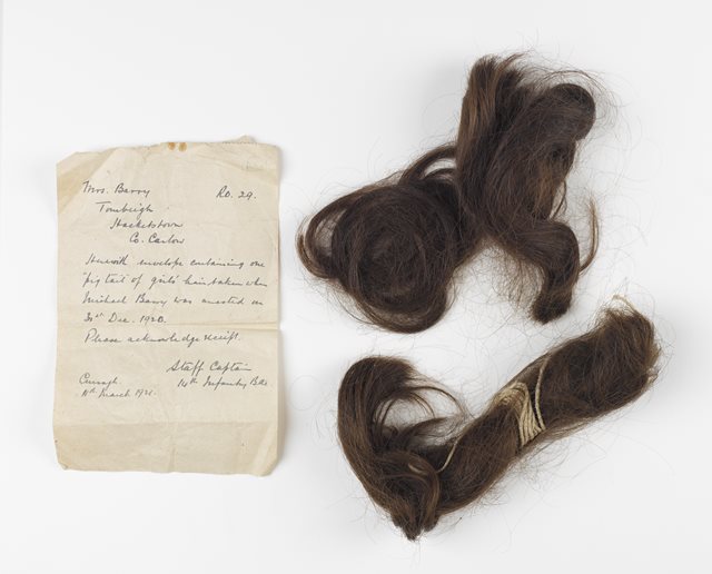 Woman's hair, punishment shearing, 1920